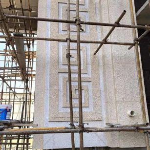 日喀则布 黄金麻花岗岩别墅外墙干挂回纹造型效果