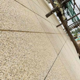 日喀则布 黄金麻花岗岩荔枝面外墙干挂石材效果示例