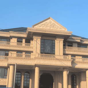 日喀则布黄金麻别墅外墙干挂石材效果示例