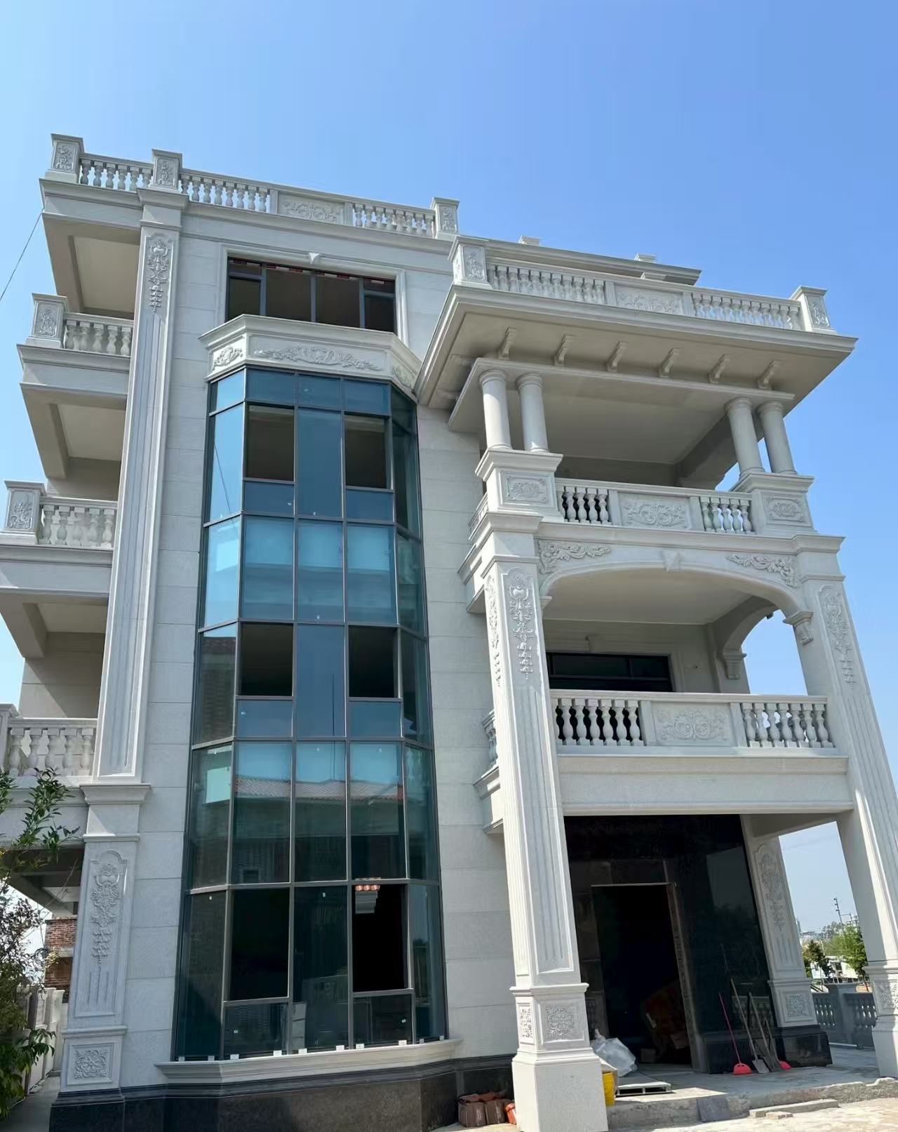 日喀则布 白麻花岗岩别墅外墙干挂效果展示